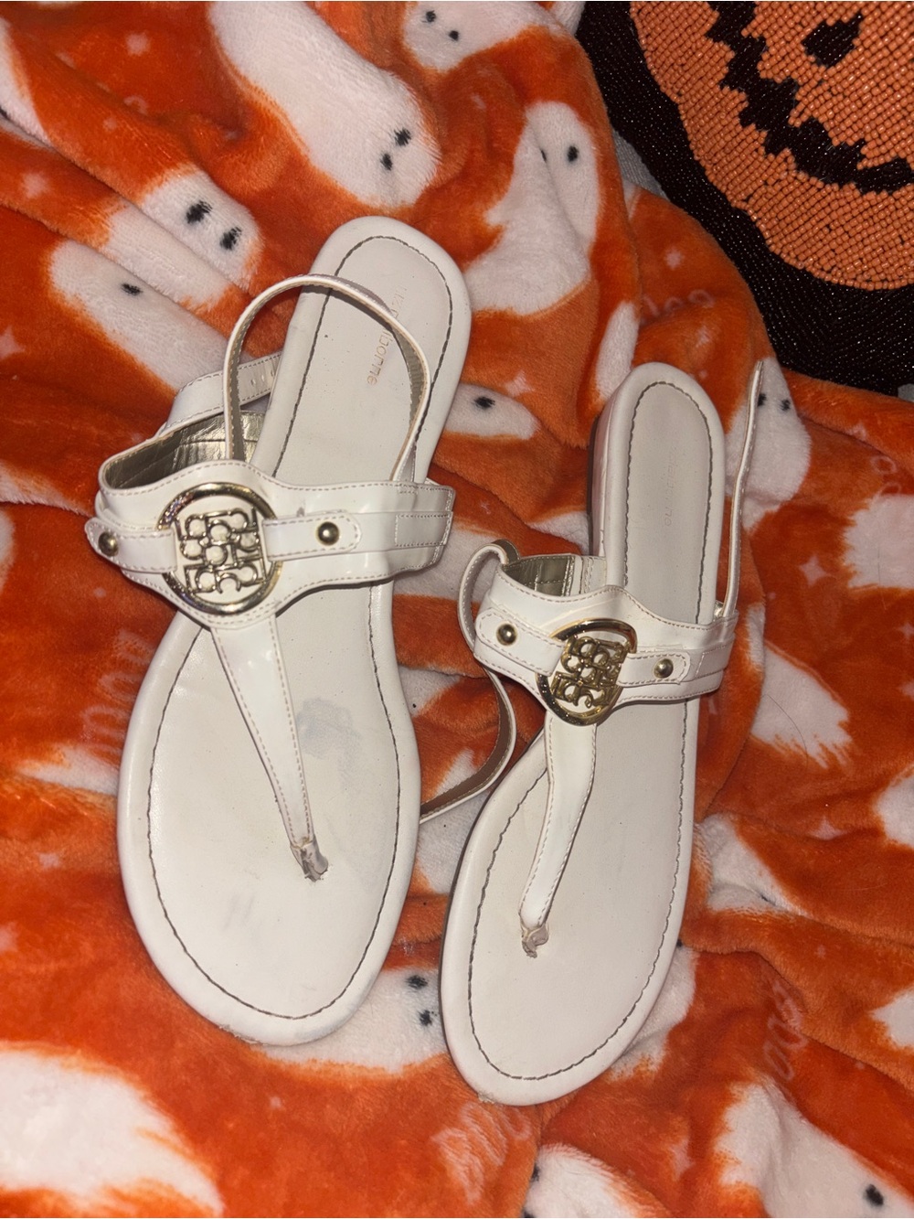 Women's White Thong Sandals with Gold Emblem